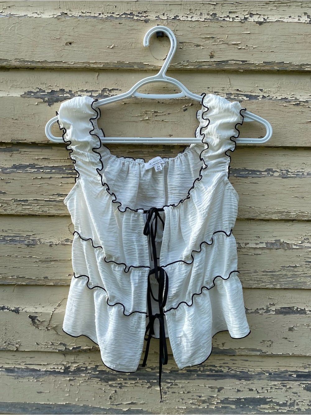 Ruffled White Camisole with Black Trim and Tie-Front